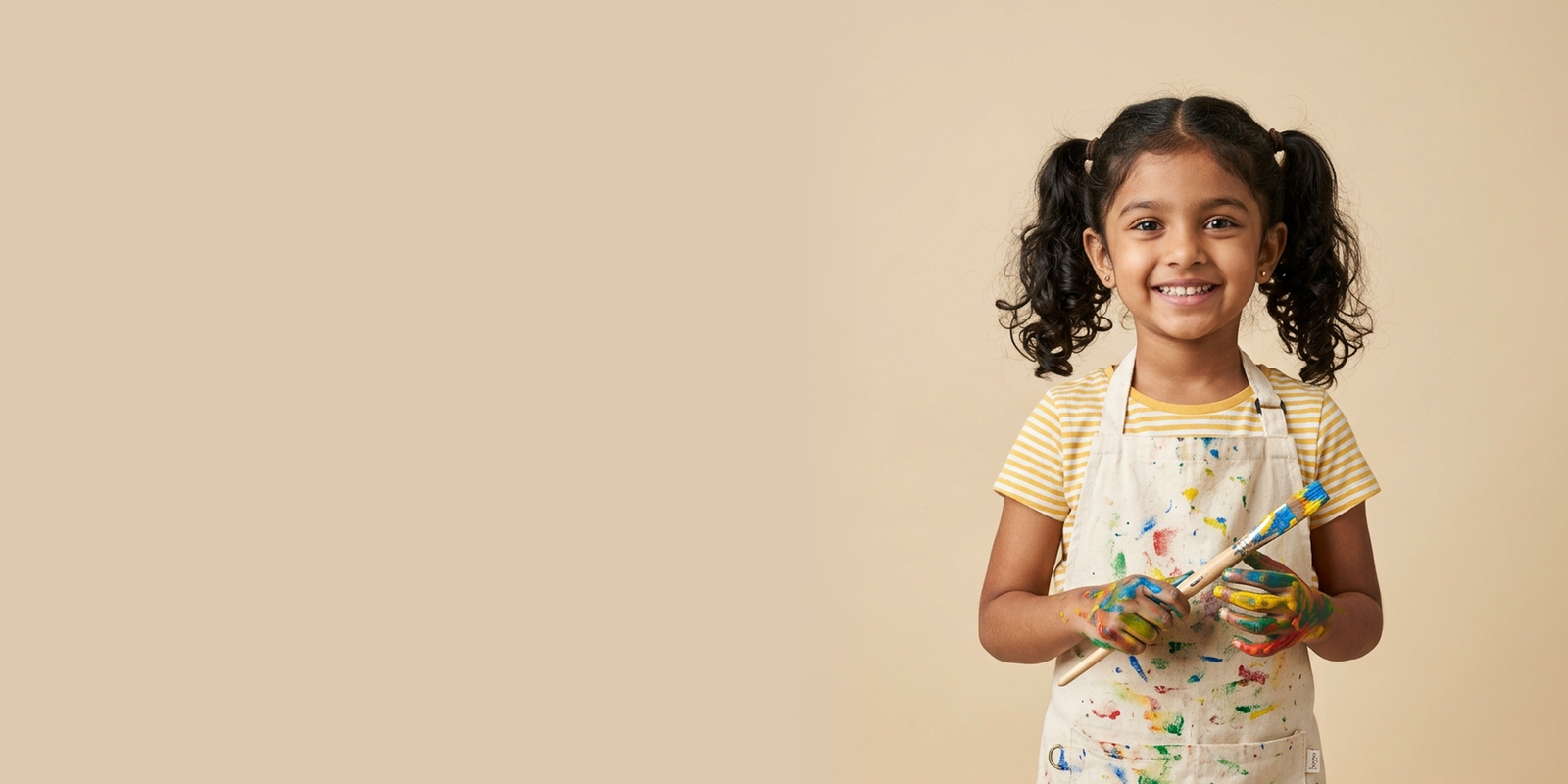 A child painting with colors